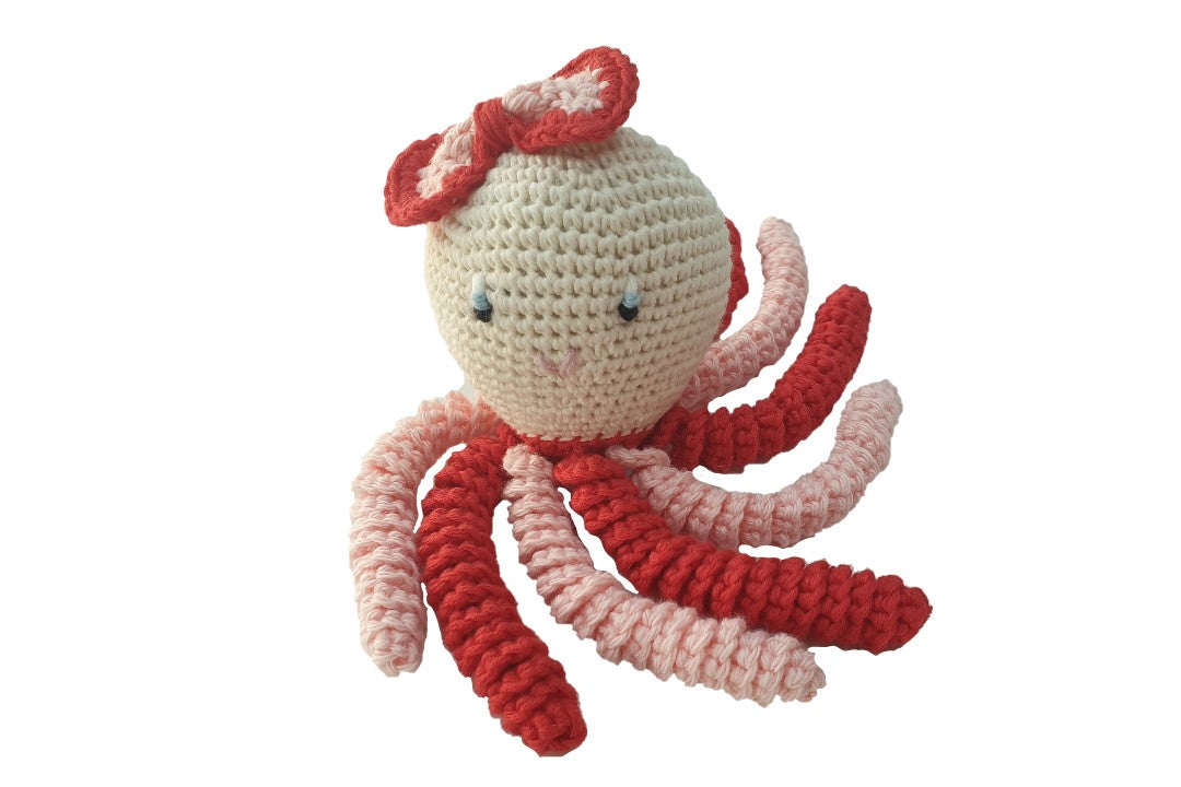 Pulpo de crochet en color rojo y rosa.